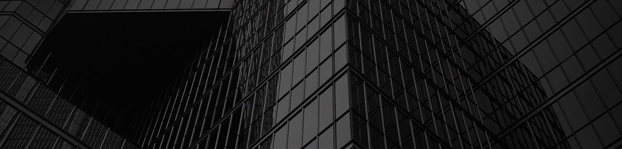 Exterior view of the windows of a large building.